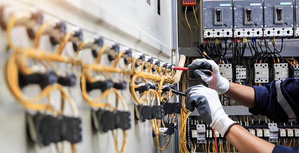 Professional Electrical Panel Upgrade technician working in Howard County County, MO